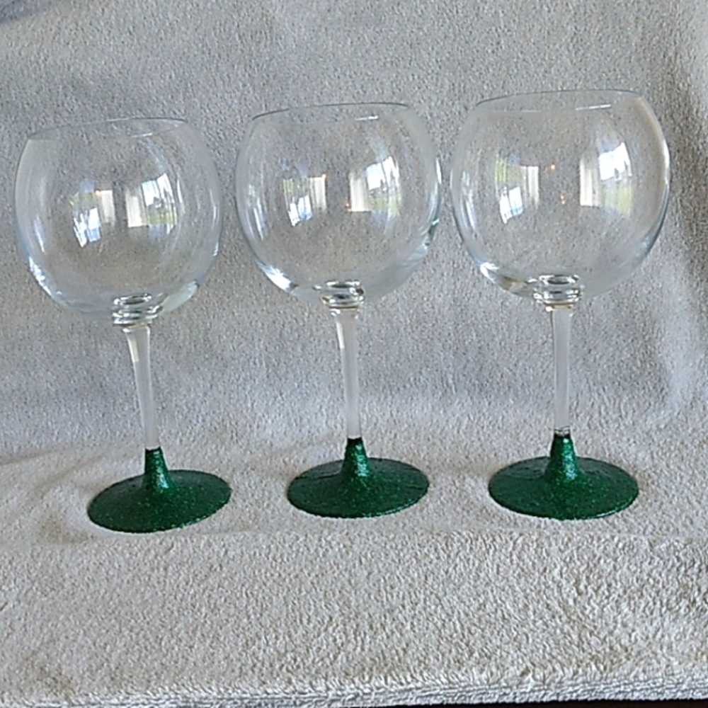Trio of green glitter wine glasses
